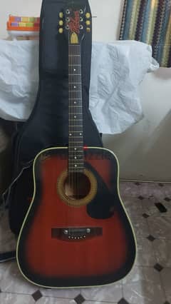 Acoustic guitar with case bag