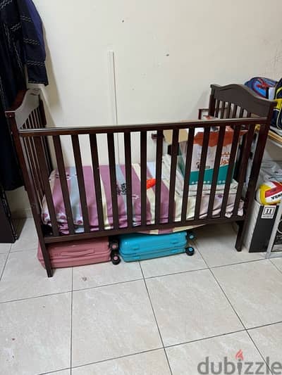 baby cot and bed