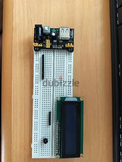 Breadboard, power header, and jumper cables for Arduino etc