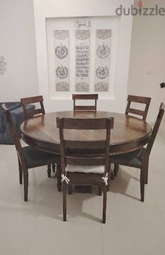 heavy wood dining table with 6 chairs