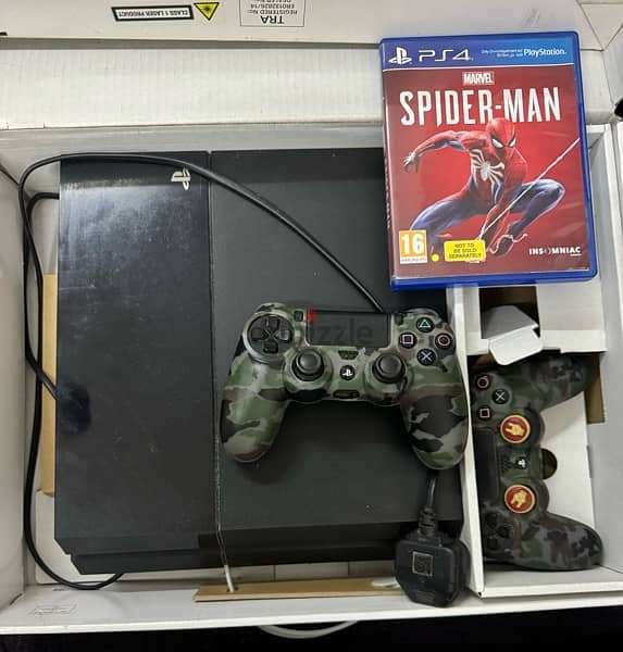 PS4 Console with 2 controllers and 3 Games 1