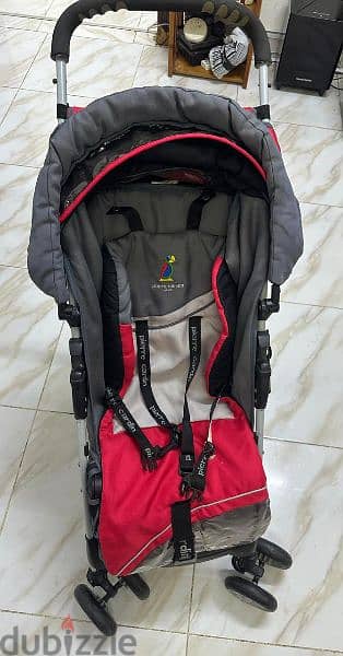 The baby stroller and car seat are in good condition. 1