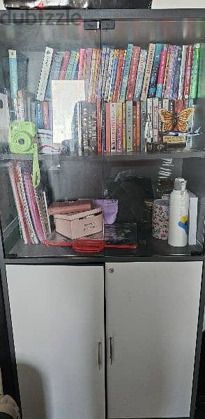 two door glass cupboard 0