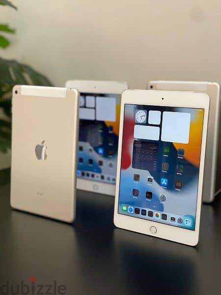 ipad mini 4 128 GB cellular + wifi original condtion whole sale price 7