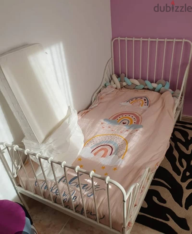 Ikea bed adjustable  from toddler to normal size bed 1