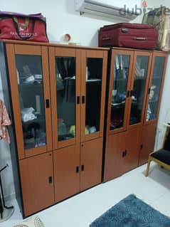 cupboard and metal bed 0