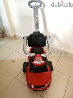 Kids ride toy car with push handle