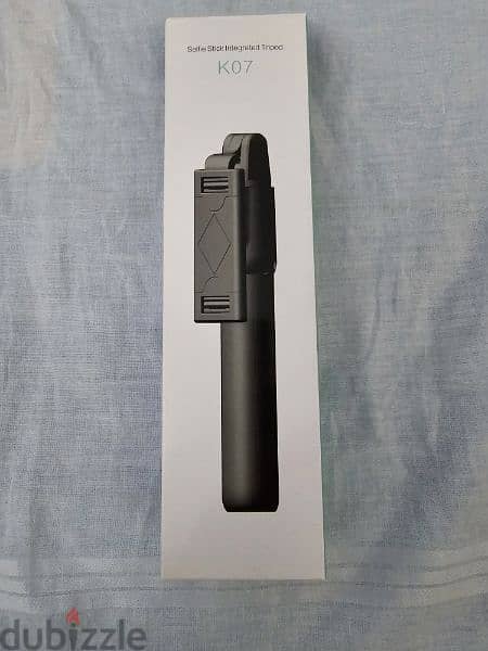 (Opened but not used) Extendable Selfie Stick with Bluetooth Remote 0