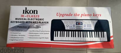 ELECTRONIC KEYBOARD WITH MP3 PLAYER