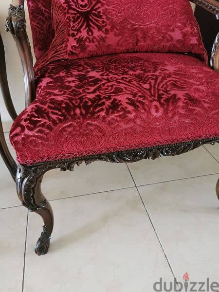 solid wood carved chairs and marble table from pan emirates 1