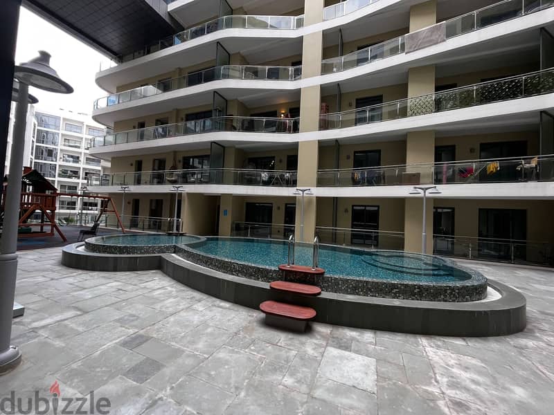 1 BR Penthouse Apartment in Muscat Hills with Shared Pool/Gym 1