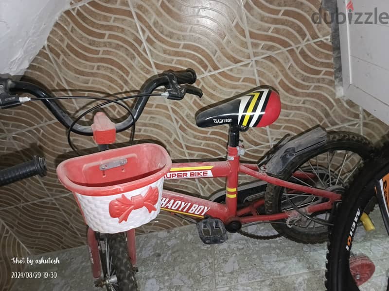 kids cycle with basket and side wheel for easy and fast learning 1