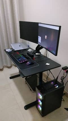 Gaming Desktop set with height adjustable table.