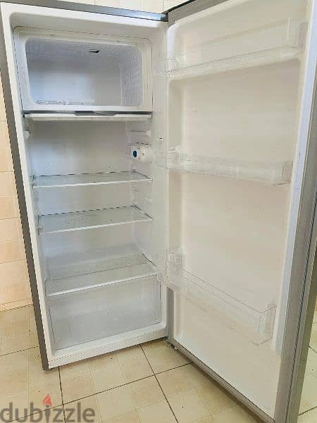 Refrigerator with 32 inch tv and a airtel setup box free 1