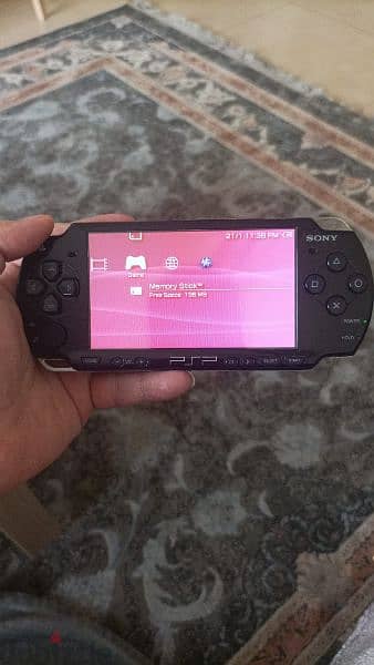 PSP with 25 games installed charger included memory card 16 gb 1