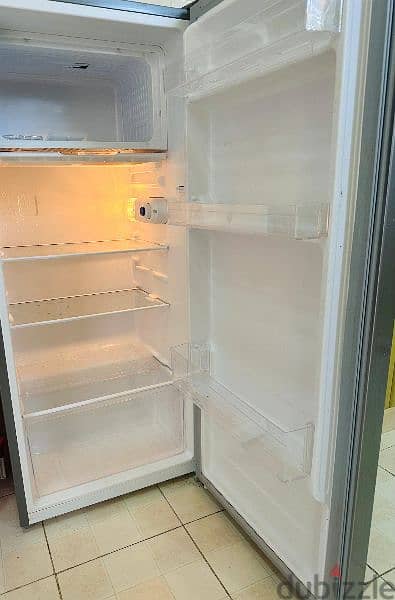 Refrigerator with 32 inch tv and a airtel setup box free 2