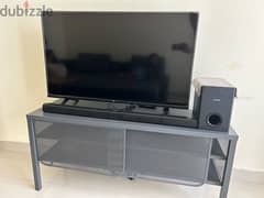 Smart TV with Table and speakers 0