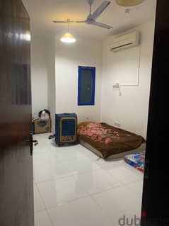 Sharing room For rent in Al maha Petrol station Building, Al Ghubra