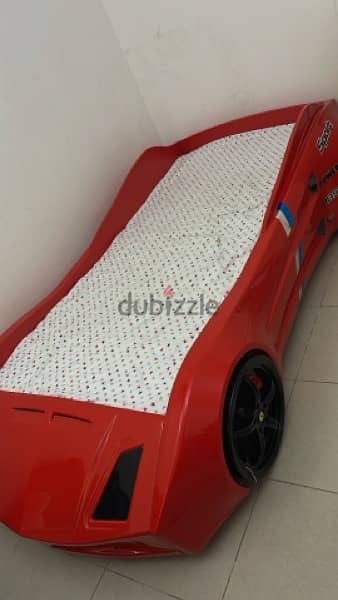 car bed and cabinet