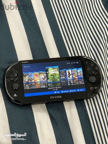 Playstation vita portable jailbreakon with 128 gb memory card 30 games 2