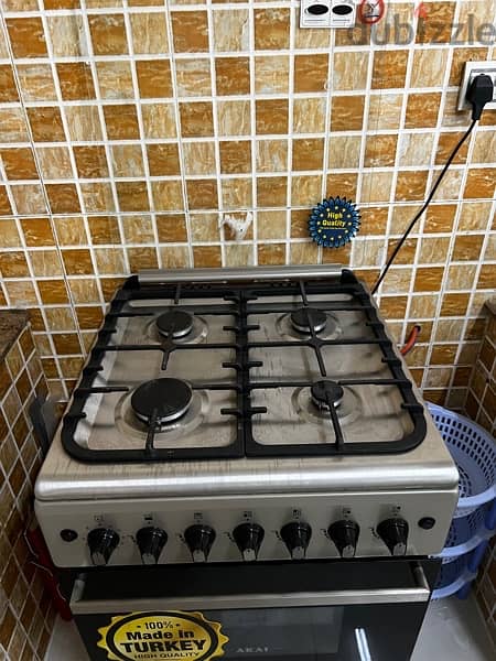 طباخة مع فرن و مكنسة كهربائيه Cooker and vacuum 2