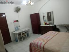 furnished rooms opposite hiton garden inn al khuwair