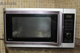 LG 28L MICROWAVE,CONVECTION, GRILL OVEN FOR SALE. 0