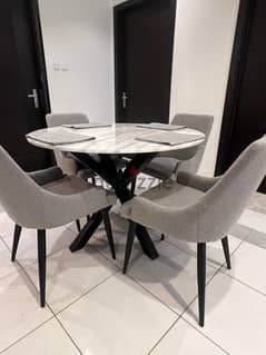 Like New Four Fabric Chairs and Circle Granite Table