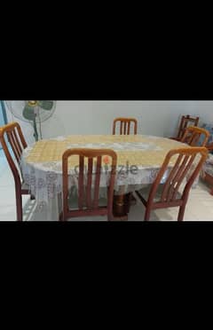 wooden Dinning table and chairs