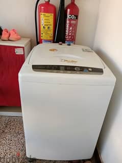 Top loading washing  good condition contact number 95175521