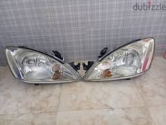 Lancer 2006 Head light 0