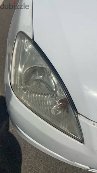 Lancer 2006 Head light 1