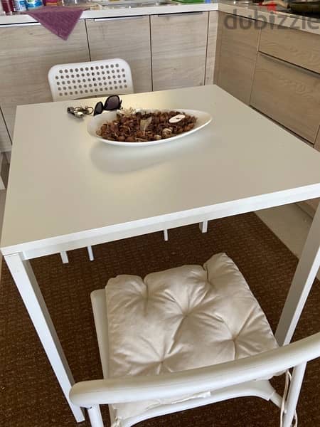 Modern dinning table with two chairs and cushions- perfectly new 3