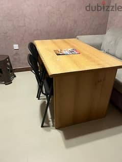 A table with 2 chairs for sale. 0