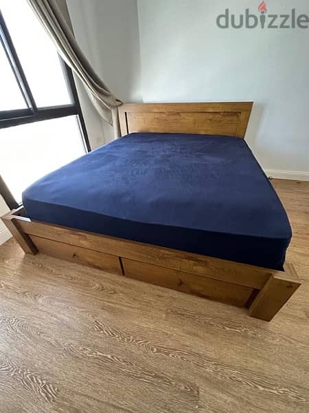 Great condition Lightly used wood bed frame for sell 1