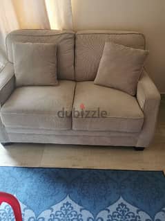 new 2 seater home center sofa perfect condition near new