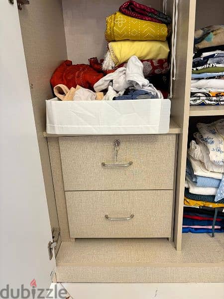 white and beige wadrobe with dressing table in middle 2