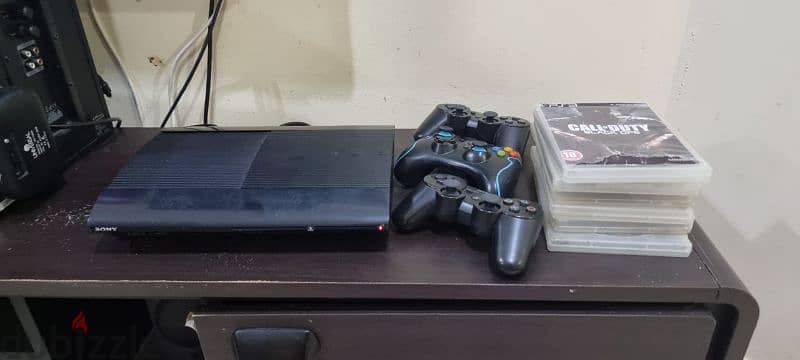 Ps3 jailbraked with 3 controller and game cds 2