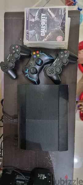 Ps3 jailbraked with 3 controller and game cds 3