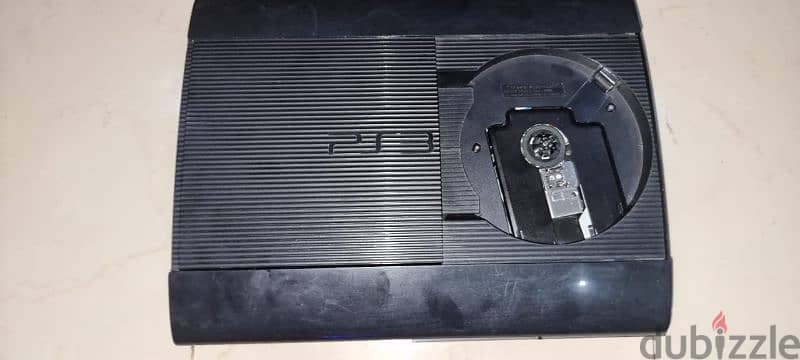 Ps3 jailbraked with 3 controller and game cds 5