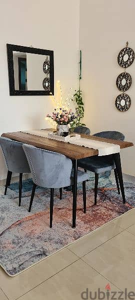 dining table with 4 chairs from pan Emirates. 1