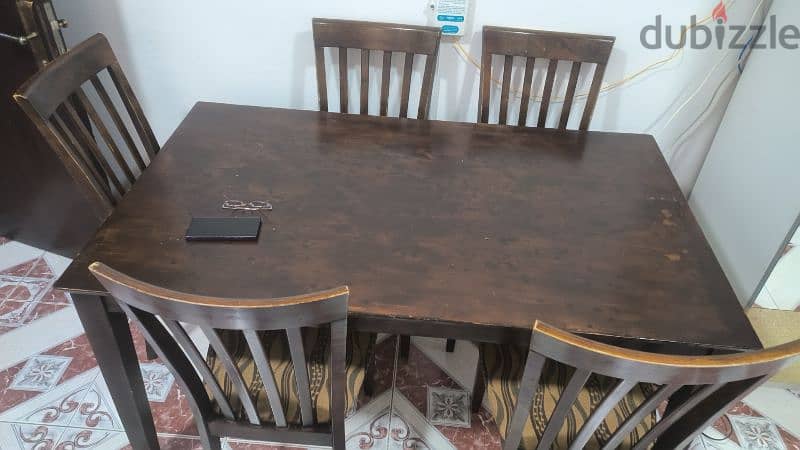 wooden dining table with six chair in good condition 1