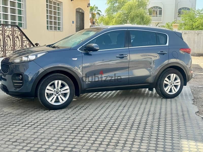 perfect condition Low milage 2016 kia sportage 67 k only lady use 7