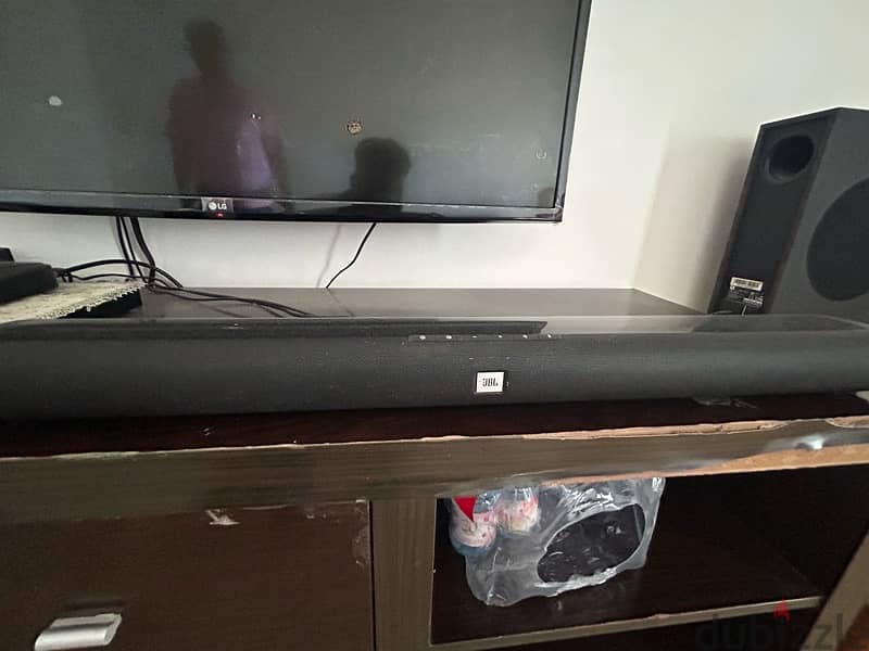 JBL brand  sound bar and LG telivision 3