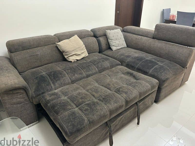 L shaped sofa set and glass Centre table 1