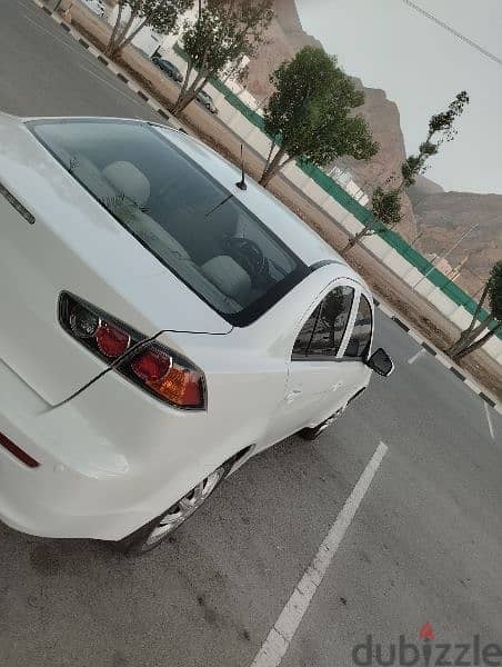 ميتسوبيشي لانسر 2015 خليجي عمان 1600cc بحالة ممتازة جدا 3