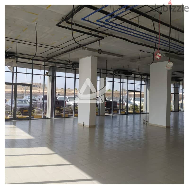 ADC203** Spacious open space Showroom for rent in Al Ghala, with total 5