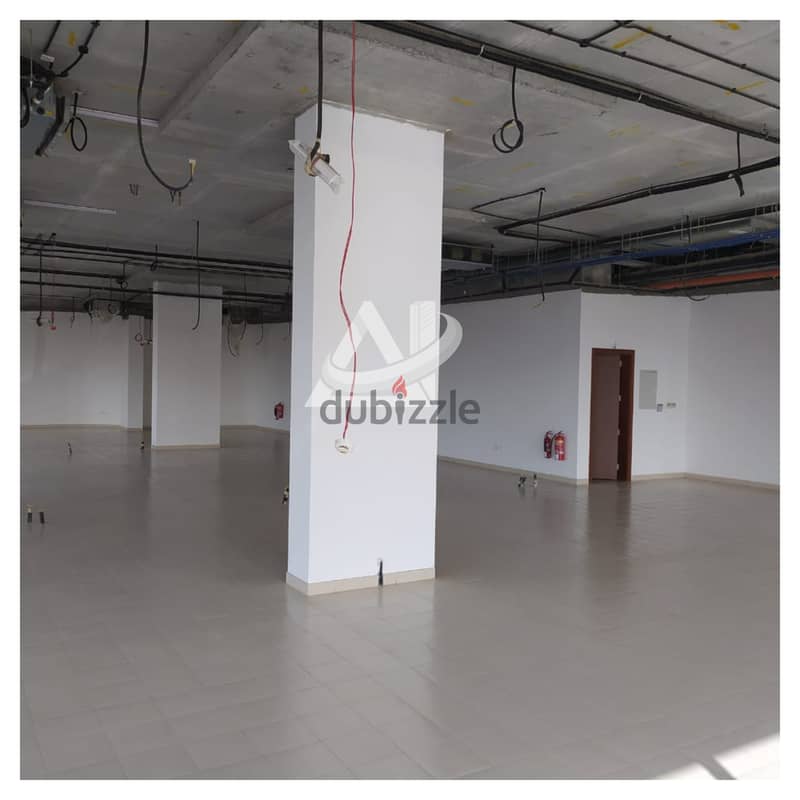 ADC203** Spacious open space Showroom for rent in Al Ghala, with total 7