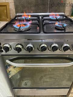 COOKING STOVE WITH OVEN