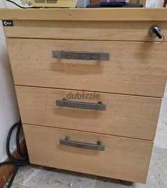 side table with 3 drawers in excellent condition. ck.